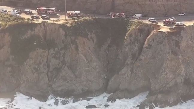 Daring rescue after vehicle flies off cliff into ocean