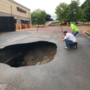 17-foot deep sinkhole opens up in Chattanooga Walgreens parking lot Thursday