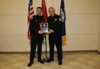 Officer Cammarn receiving Award for 2015 Police Officer of the Year OFFICEROFYEAR.jpg